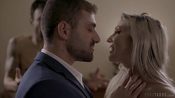 A muscular bearded man fists a busty blonde completely forgetting about his wife